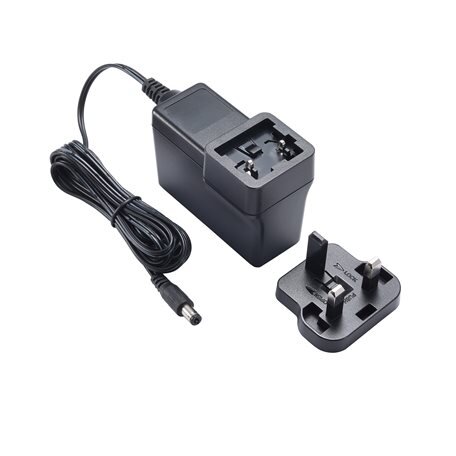 Moxa (PWR-12150-WPUK-S2) nefiksuojamas cilindrinis kištukas, 12 VDC, 1.5 A, 100...240 VAC, UK kištukas, Darbinė temperatūra: 0...40 °C